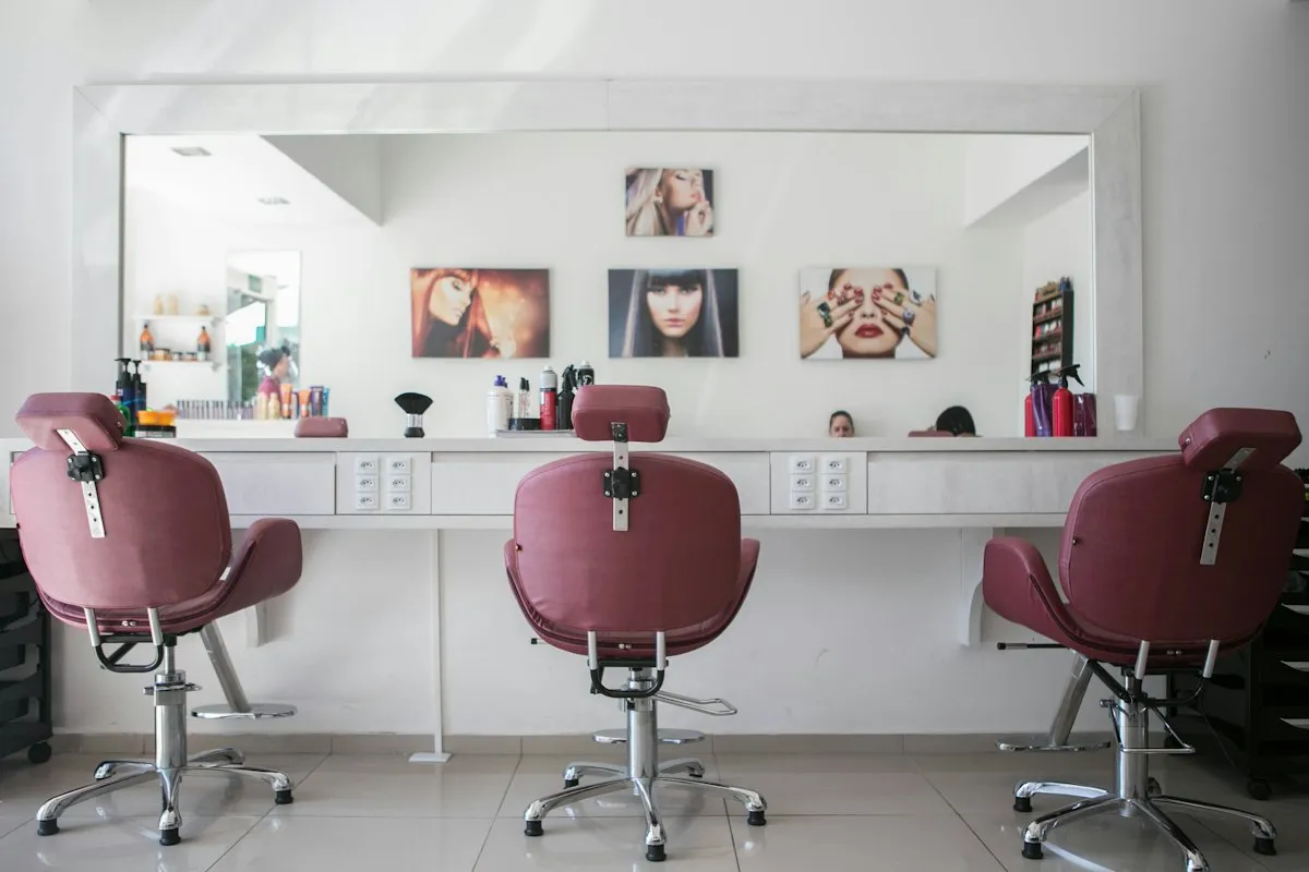 Strand Hair Studio sleek styling stations and warm lighting